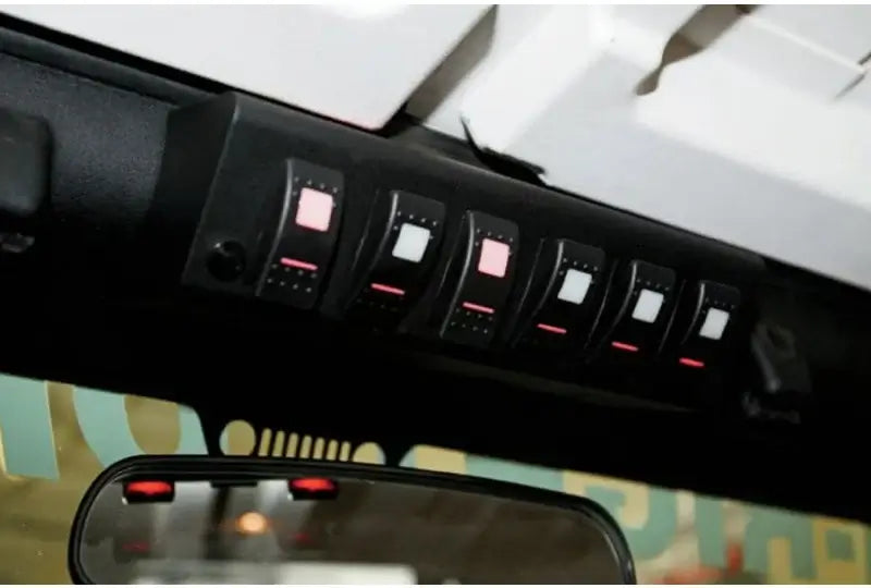 SPOD SourceLT with LED switch panel installed in Jeep JK 2009+, providing control for 12VDC accessories without complex wiring