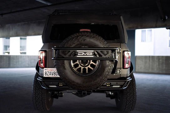 DV8 2021-2023 FORD BRONCO | SPARE TIRE GUARD & ACCESSORY MOUNT - Offroad Outfitters